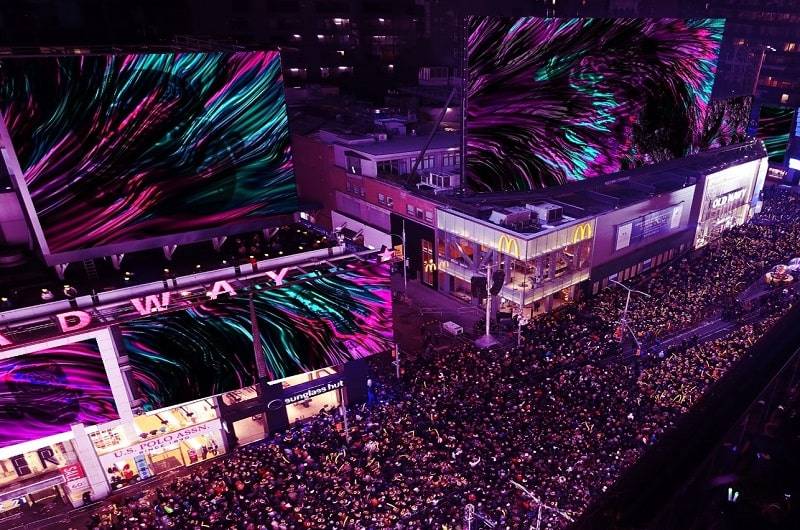 Thousands of web3 anonymous hackers trying to mess with interactive art in New York Times Square?