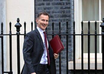 Autumn statement live: will chancellor unveil tax and benefit cuts?