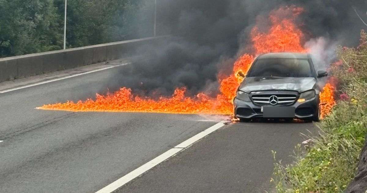 Pictures show scale of fierce car fire which shut major road