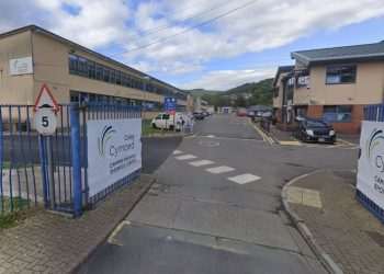 Tearful support worker denies grabbing student and colleague during fire drill